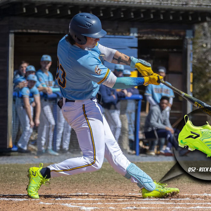 Phenom Elite Rick and Morty Quantum Speed 2.0 cleats in action on the baseball diamond — slime green low-cut speed cleats with portal-inspired graphics