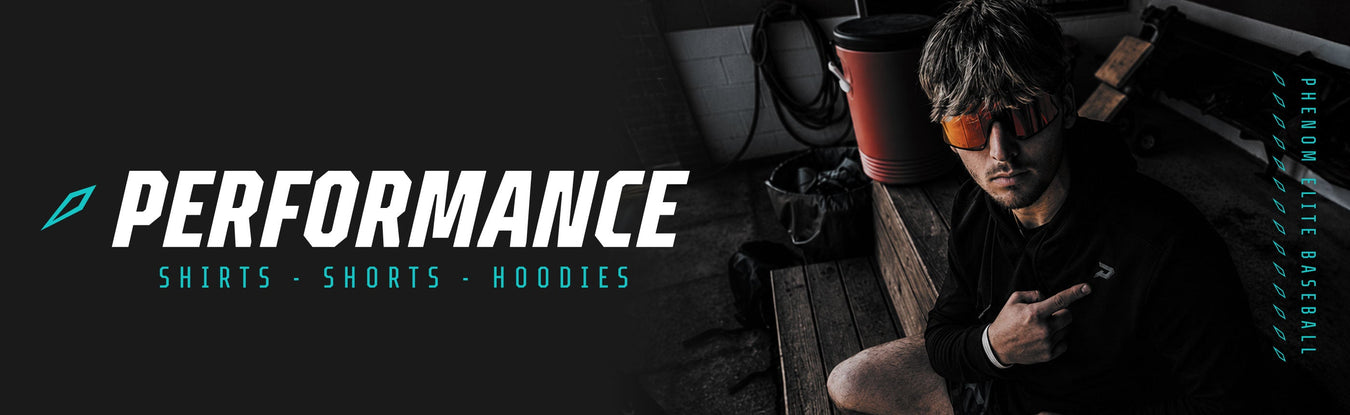 Phenom Elite Baseball Apparel collection — tees, hoodies, hats, and performance gear featured against a teal Phenom Elite Baseball background