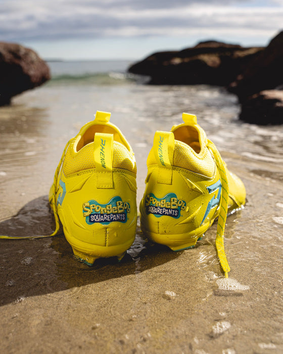 Phenom Elite SpongeBob cleat lifestyle photo — game day shot