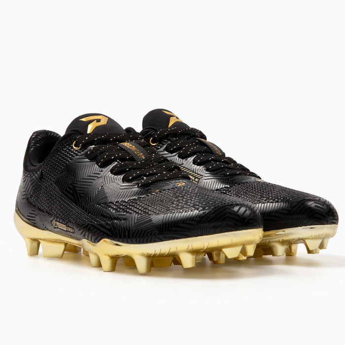 Phenom Elite Quantum Carbon Gold Rush Black & Gold cleat — blackout carbon-plate low-cut speed cleat with metallic gold accents, hero shot