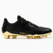 Phenom Elite Quantum Carbon Gold Rush Black & Gold cleat — back heel view with metallic gold detailing