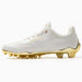 Phenom Elite Quantum Carbon Gold Rush White & Gold cleat — close-up of white upper and gold accents