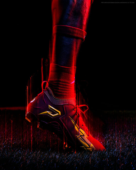 Phenom Elite The Flash cleat lifestyle photo — athlete wearing cleats