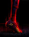 Phenom Elite The Flash cleat lifestyle photo — athlete wearing cleats